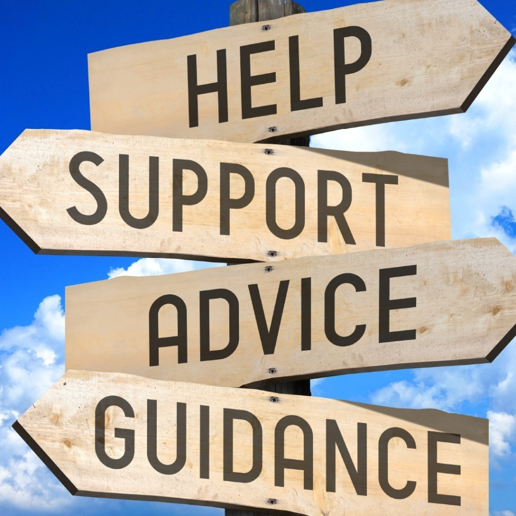 A wooden signpost with arrows pointing in various directions, each with a single word: "help," "support," "advise," and "guidance," in front of a blue sky with fluffy white clouds